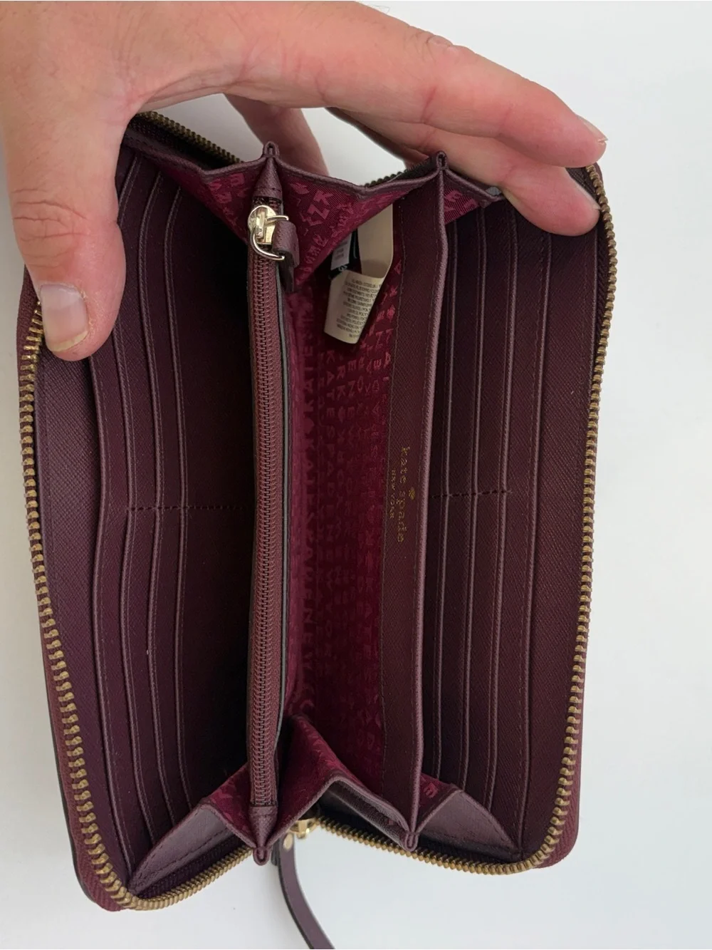 kate spade Zip-Around Wallet in Burgundy with Gold Hardware